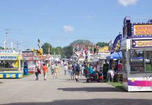 2022 Ohio agricultural fair schedule Fairgoers walk around at the Canfield Fair.