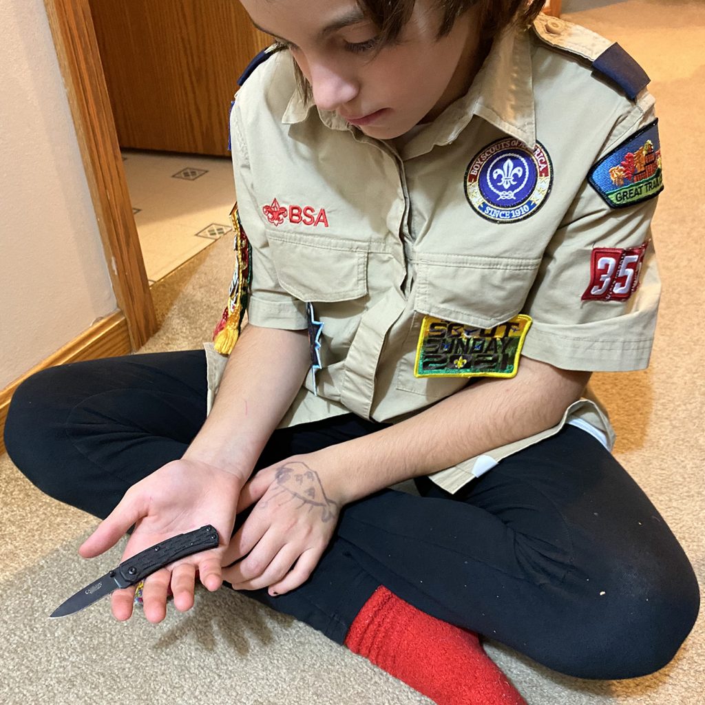 Vayda holding her pocket knife