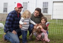 Heritage turkeys part of historical connection for Brockett Family Farm A couple and their two daughters with a turkey.