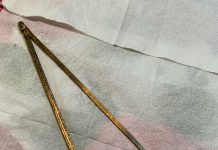 Can you name the intricate brass tool?