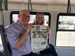 Visiting Cabo San Lucas with the Weavers Lance and Jaimye Weaver hold the Farm and Dairy on the bus in Cabo San Lucas, Mexico