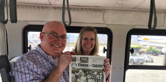 Lance and Jaimye Weaver hold the Farm and Dairy on the bus in Cabo San Lucas, Mexico