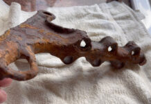 Can you identify this antique metal item?