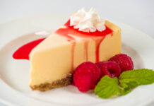 Dakota's Favorite Cheesecake - Cheesecake with a Raspberry and Sour Cream topping