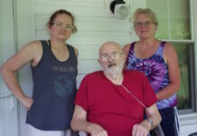 W.Va. ag hall of fame inductee Bill Ingram reflects on years of dairy farming Two women and a man on the porch of a farmhouse.