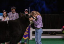 Ohio State Fair Sale of Champions breaks all records Ryleigh Egbert and her Grand Champion Market Beef Steer