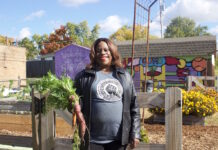 Southeast Gardens and Urban Farm focuses on community, sustainable ag A woman stands in front of a garden in Columbus.