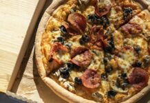 Empty nest dining style pizza