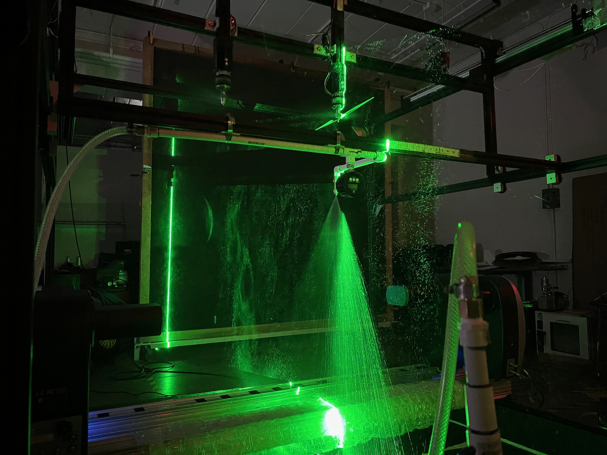 laser reflects off spray droplets