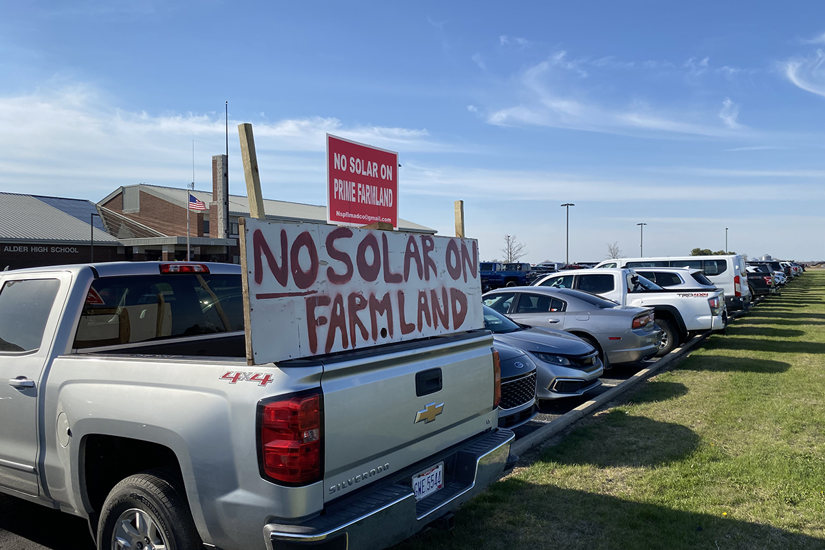 A sign on a truck