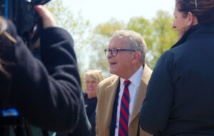 medium headshot of Ohio Governor Mike Dewine smiling