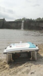 The Pixie drone moves through the Hinckley Reservation lake and picks up floating debris and plastic on May 19.Credit: Nella Citino