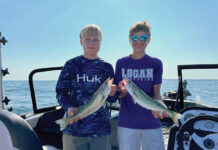 Hatch results released for Lake Erie walleye, yellow perch two boys with fish
