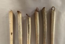 On the frontier, tallow candles were expensive to make and used sparingly mold-made tallow candle