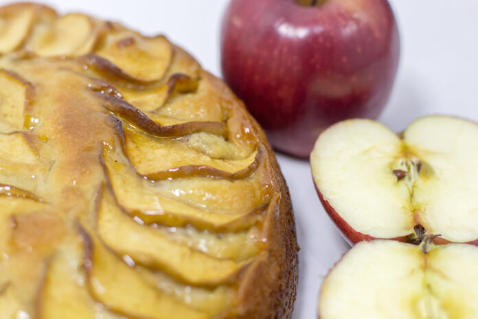 Apple pie tart, ingredients - apples on white background - top v